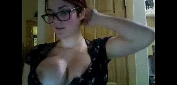  This brunette with glasses shows flash her big boobs